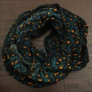 Green scarf with black and orange cheetah print